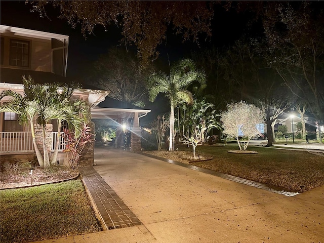 view of property's community featuring a yard