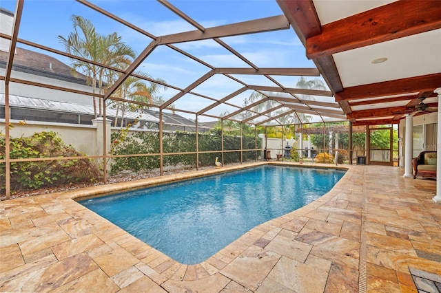 view of pool featuring a lanai and a patio area