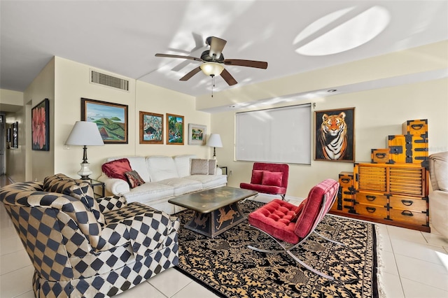 living room featuring light tile patterned floors and ceiling fan