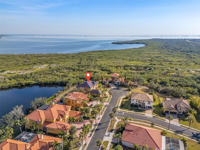 drone / aerial view with a water view