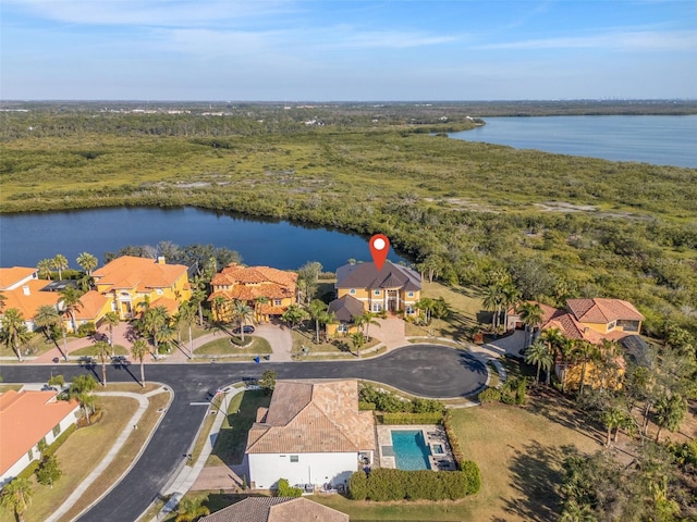 drone / aerial view with a water view