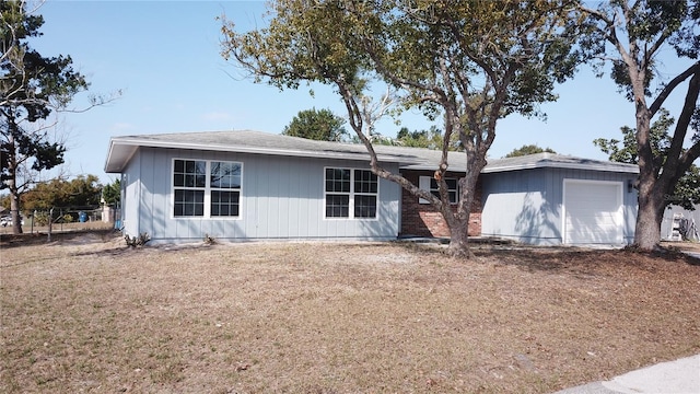 ranch-style home with a garage