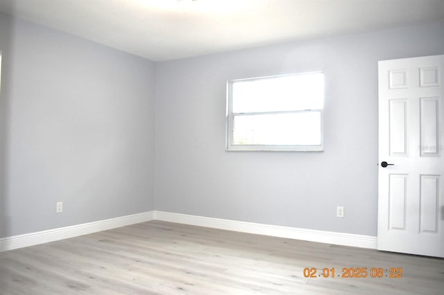 unfurnished room featuring light hardwood / wood-style floors