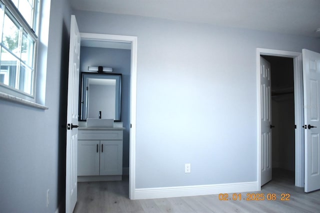 unfurnished bedroom with light hardwood / wood-style flooring