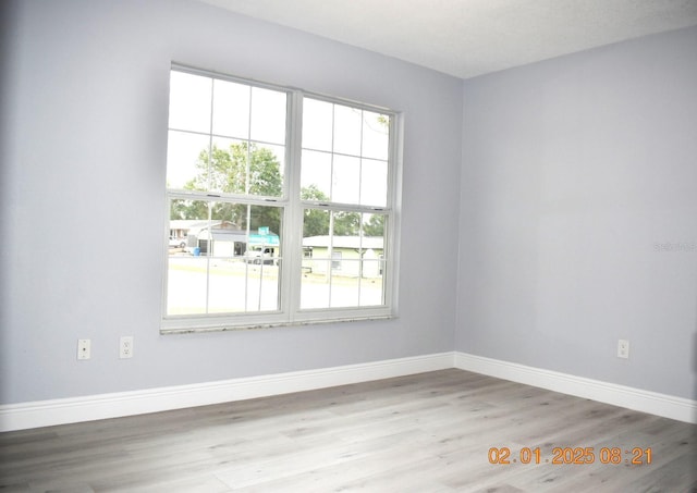 empty room featuring light hardwood / wood-style floors