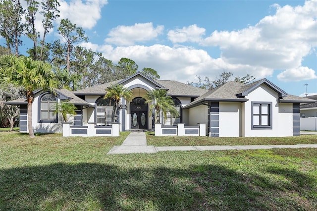 view of front facade with a front yard