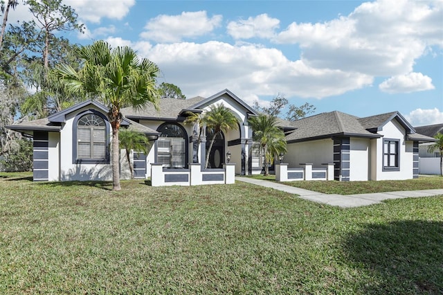 view of front of property with a front lawn