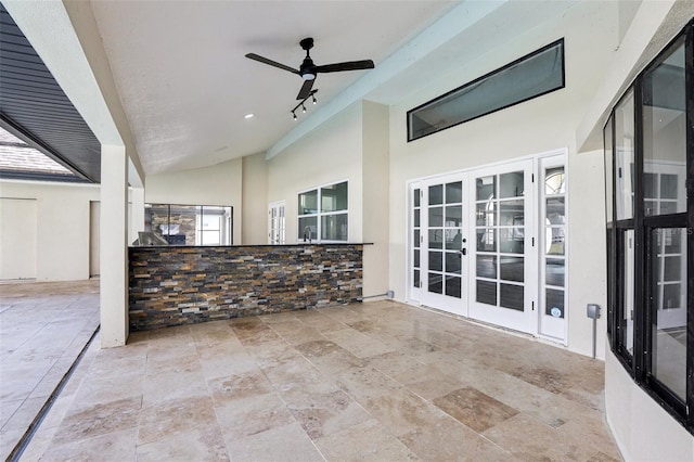 view of patio / terrace featuring french doors and ceiling fan