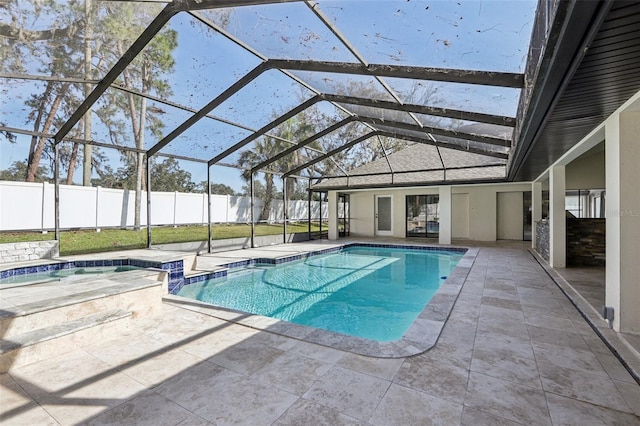 view of pool with a lanai and a patio