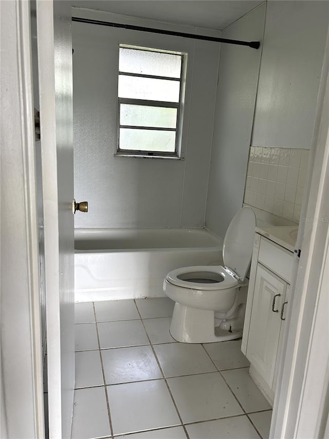 full bathroom with toilet, tile patterned flooring, bathtub / shower combination, and vanity