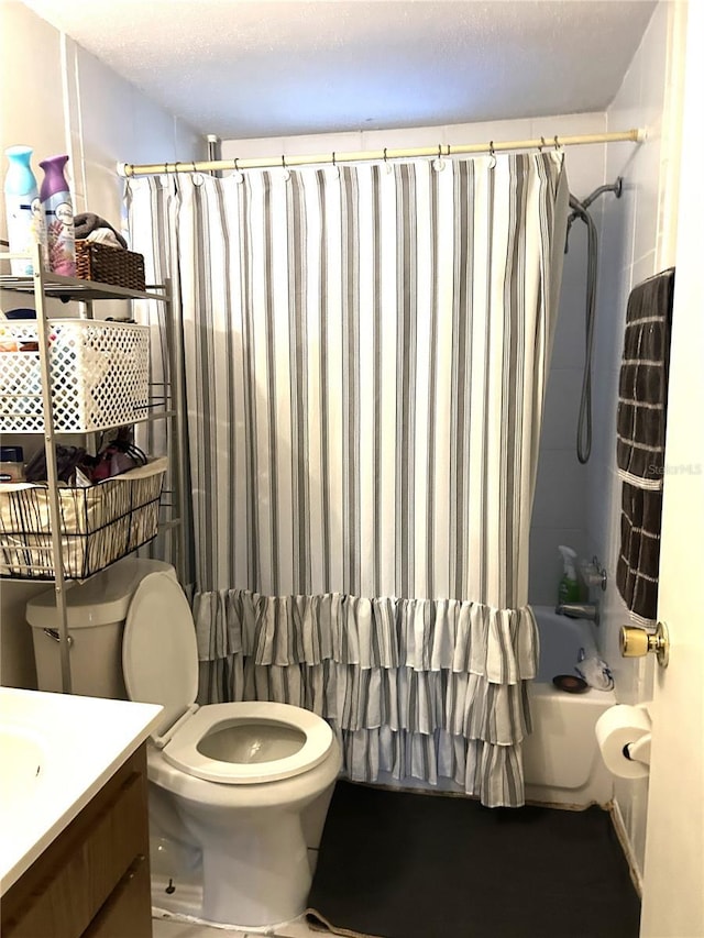 full bathroom featuring vanity, shower / bath combination with curtain, and toilet