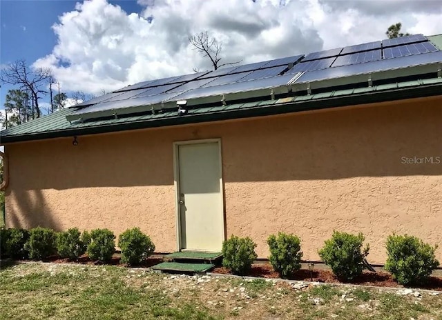 exterior space featuring solar panels