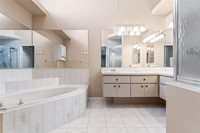 bathroom featuring independent shower and bath, vanity, and tile patterned floors