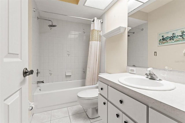 full bathroom featuring vanity, tile patterned floors, toilet, and shower / tub combo with curtain