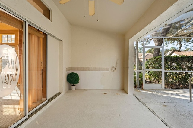 interior space featuring ceiling fan