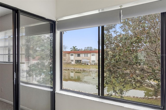 interior details featuring a water view