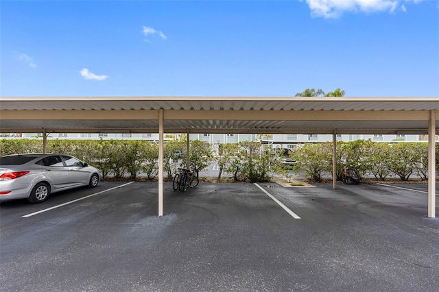 view of parking with a carport