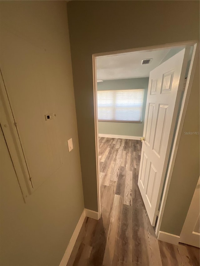 corridor featuring hardwood / wood-style flooring