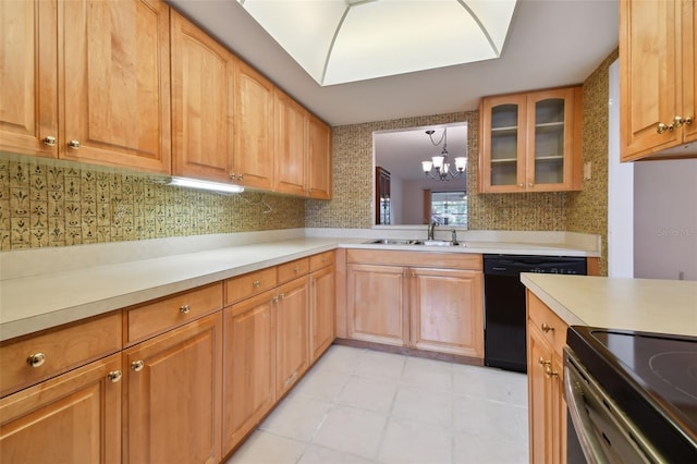 kitchen featuring decorative light fixtures, black dishwasher, sink, backsplash, and a chandelier