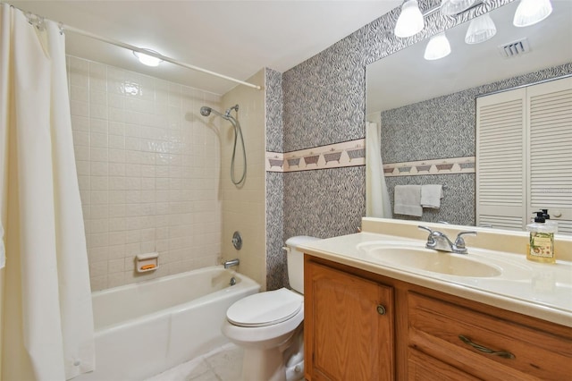 full bathroom with vanity, toilet, and shower / bath combo with shower curtain