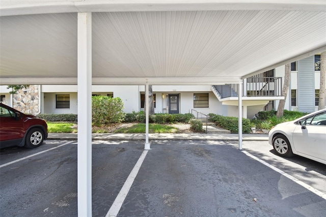 view of vehicle parking featuring a carport