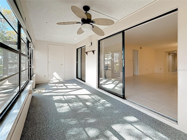 1601 43rd St N Unit 133, Saint Petersburg, FL 33713 - unfurnished sunroom with a ceiling fan