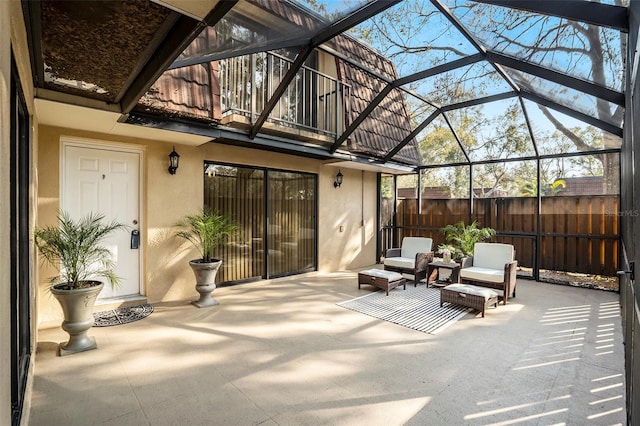 view of patio / terrace with a lanai