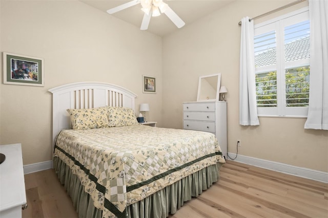 bedroom featuring ceiling fan and light wood-type flooring