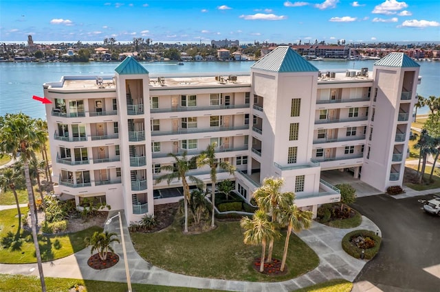 view of building exterior featuring a water view