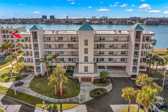 view of property with a water view