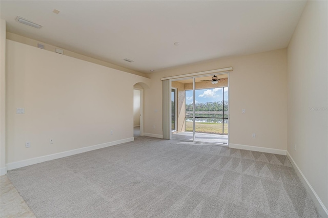 empty room featuring light colored carpet