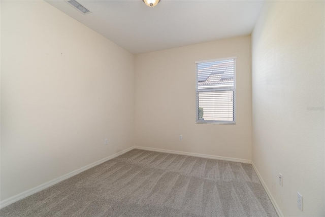 unfurnished room featuring carpet flooring