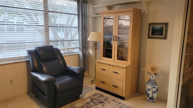 5880 38th Ave N Unit 204, Saint Petersburg, FL 33710 - sitting room featuring light tile patterned floors