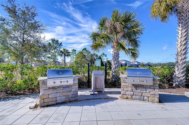 view of patio / terrace featuring an outdoor kitchen and area for grilling