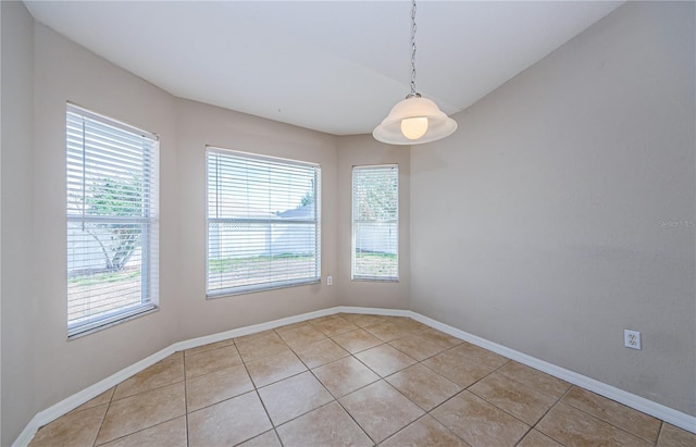 view of tiled spare room