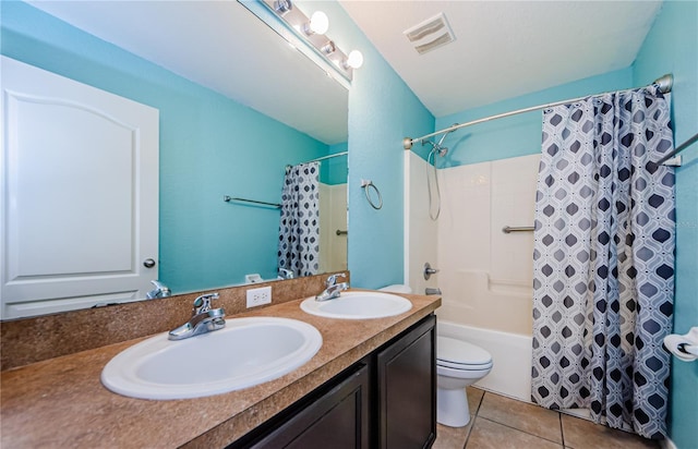 full bathroom featuring shower / bath combination with curtain, vanity, toilet, and tile patterned flooring