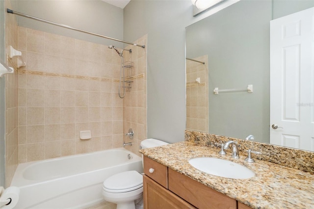 full bathroom with vanity, toilet, and washtub / shower combination