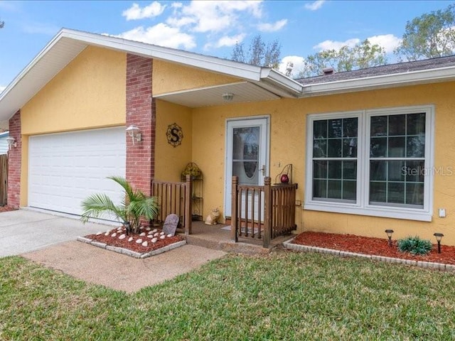 view of front facade with a garage and a front lawn