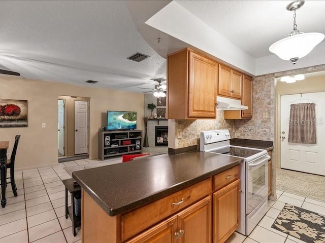 kitchen with a breakfast bar area, light tile patterned floors, ceiling fan, white range with electric stovetop, and backsplash