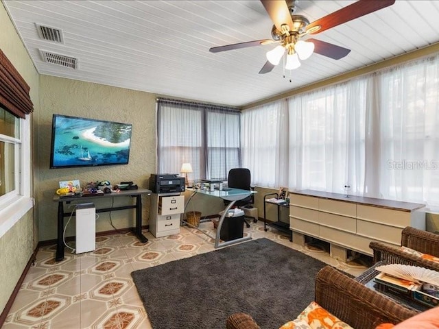 office space with ceiling fan