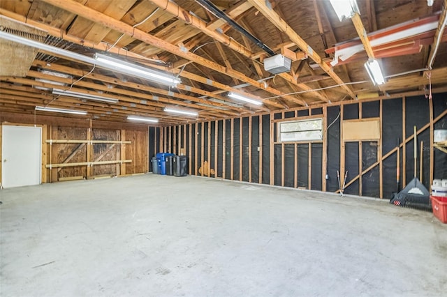 garage featuring a garage door opener