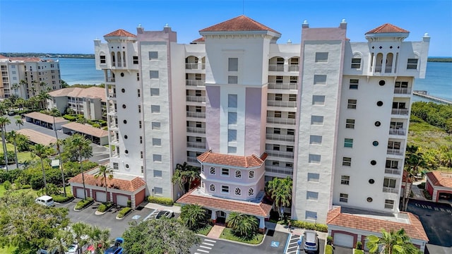 view of building exterior with a water view