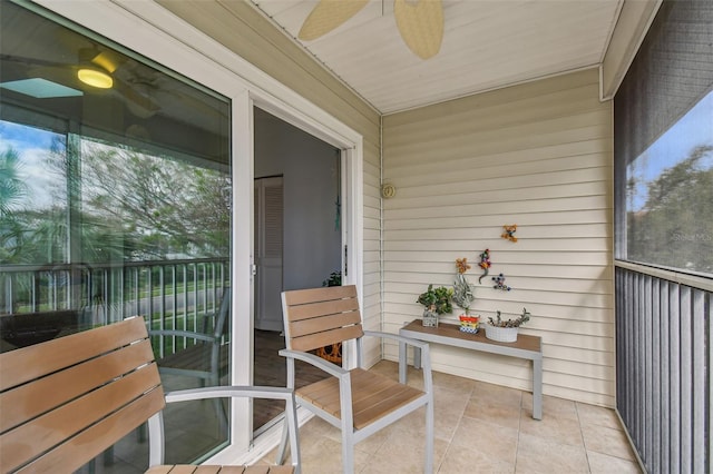 balcony featuring ceiling fan