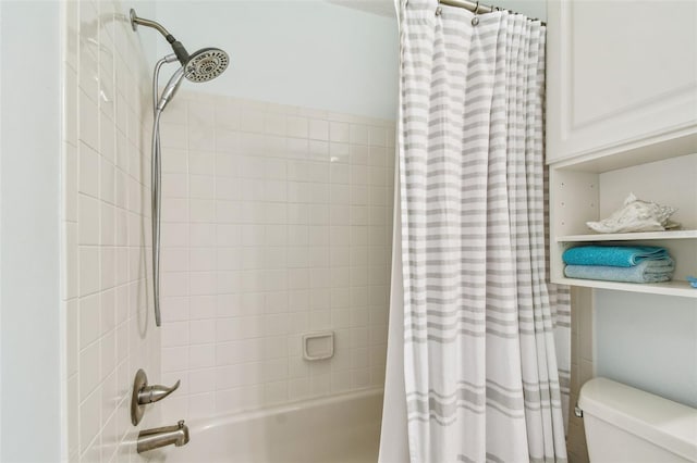 bathroom with toilet and shower / tub combo