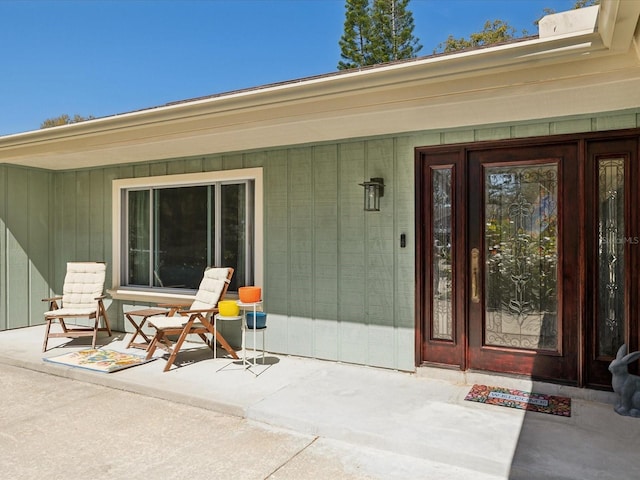 doorway to property featuring a porch