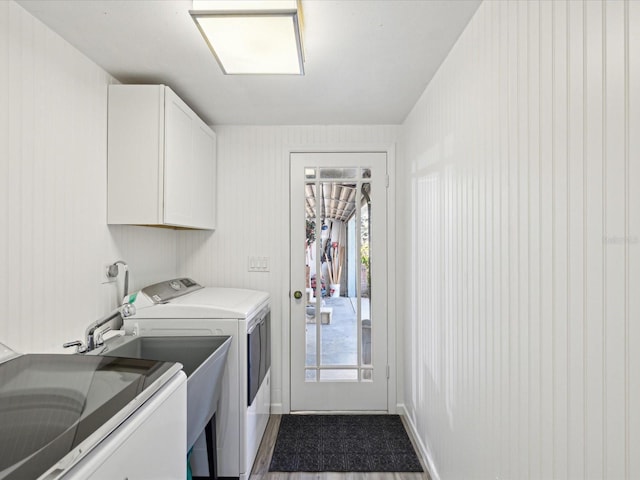 laundry room featuring cabinet space and washing machine and clothes dryer