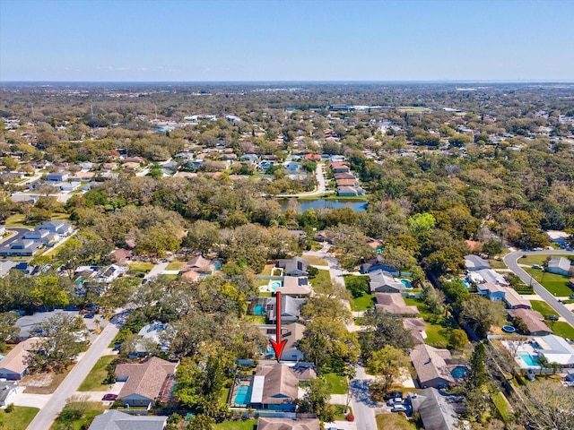 bird's eye view with a water view and a residential view