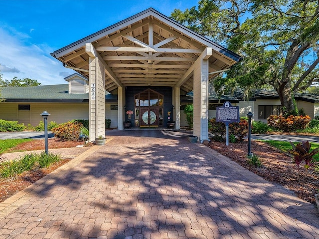 exterior space featuring decorative driveway