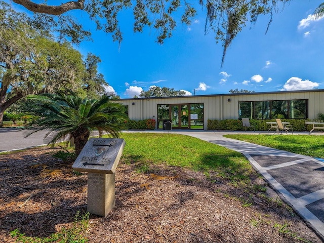 surrounding community featuring a lawn