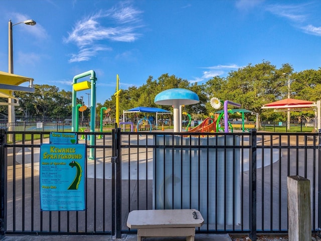 communal playground featuring fence